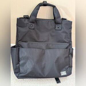 Anello bag with multiple pockets. Used as a backpack or hand carry or crossbody.